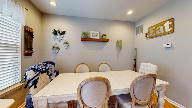 dining area with recessed lighting, visible vents, and baseboards