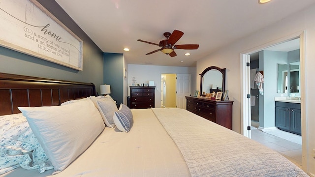 bedroom with recessed lighting, light tile patterned floors, ensuite bathroom, and a ceiling fan