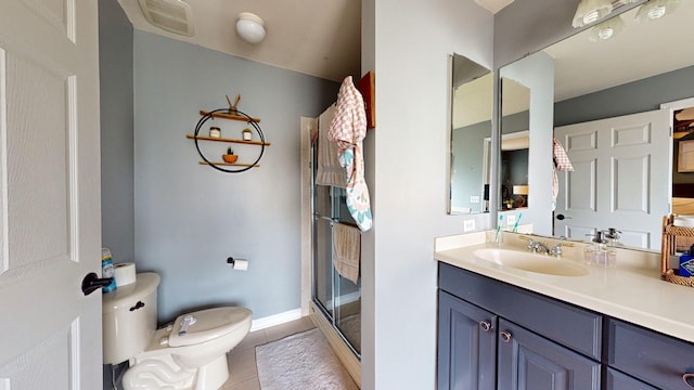 bathroom with vanity, a stall shower, tile patterned floors, toilet, and visible vents