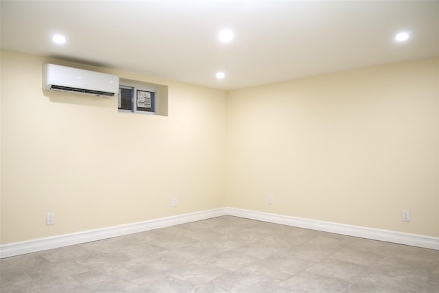 basement featuring a wall mounted AC