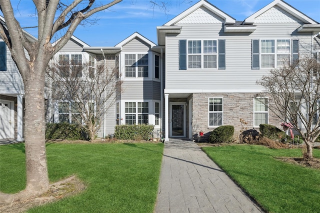 view of front of home with a front lawn