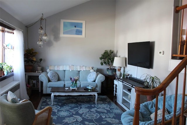 living room with vaulted ceiling