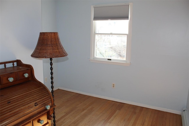 bedroom with light hardwood / wood-style flooring