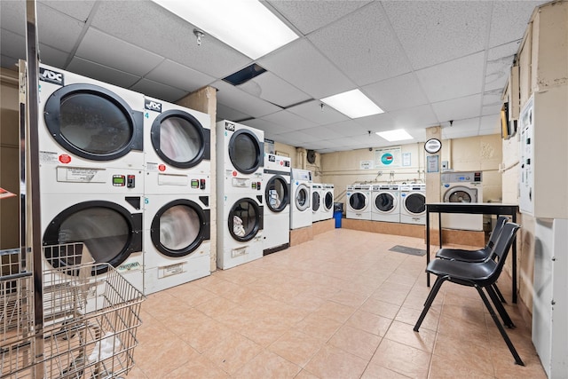 laundry room featuring washer and dryer and stacked washer and clothes dryer