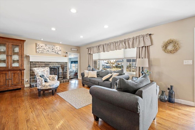 living room with light hardwood / wood-style floors