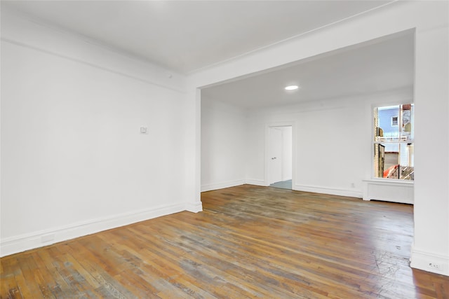 empty room featuring dark hardwood / wood-style floors