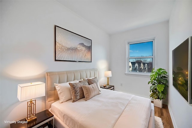 bedroom featuring hardwood / wood-style flooring