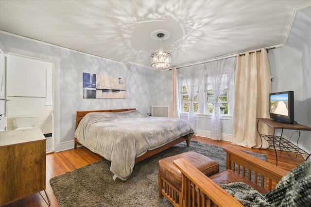 bedroom featuring hardwood / wood-style floors