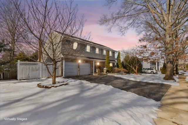 front facade with a garage