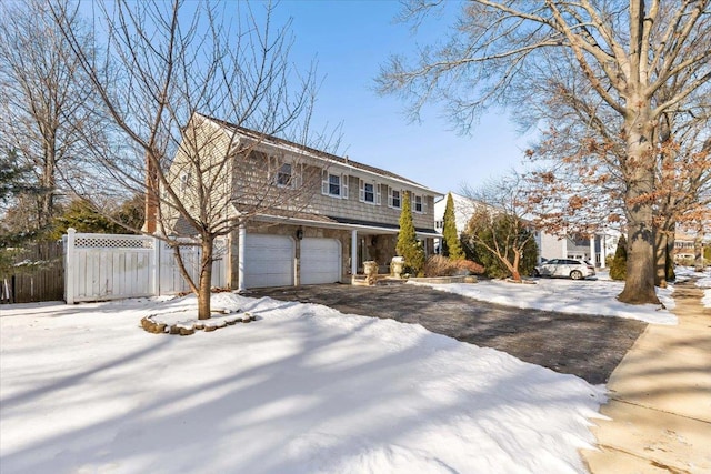 front of property with a garage