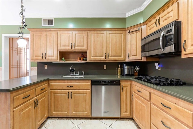 kitchen featuring decorative light fixtures, sink, kitchen peninsula, stainless steel appliances, and crown molding