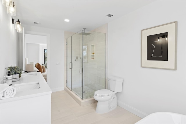 bathroom with an enclosed shower, vanity, and toilet