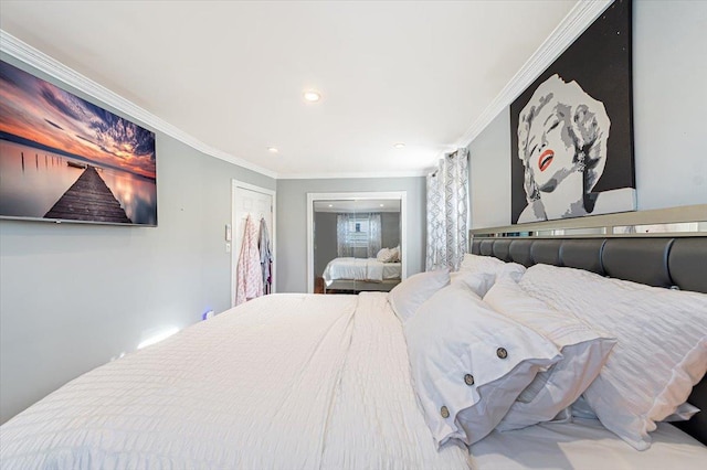 bedroom with ornamental molding