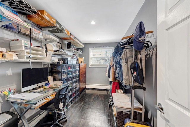 office area featuring dark hardwood / wood-style flooring and baseboard heating