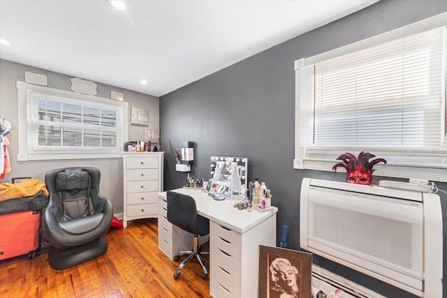 office with light hardwood / wood-style floors