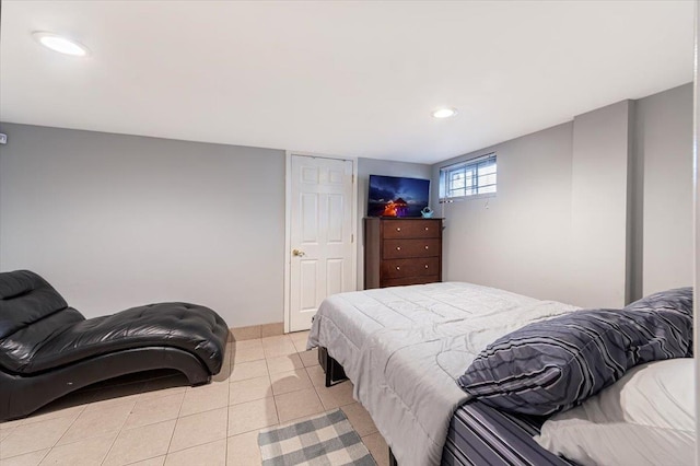 bedroom featuring light tile patterned flooring