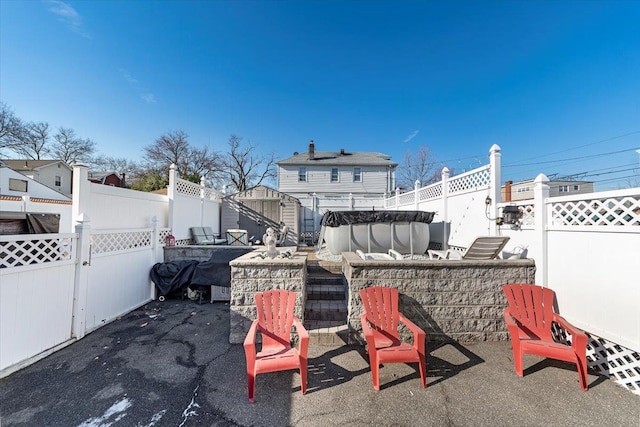 view of patio featuring an outdoor bar