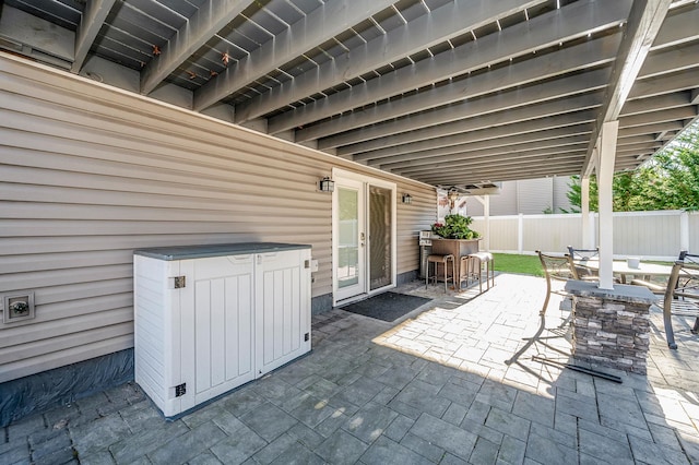 view of patio / terrace featuring an outdoor bar