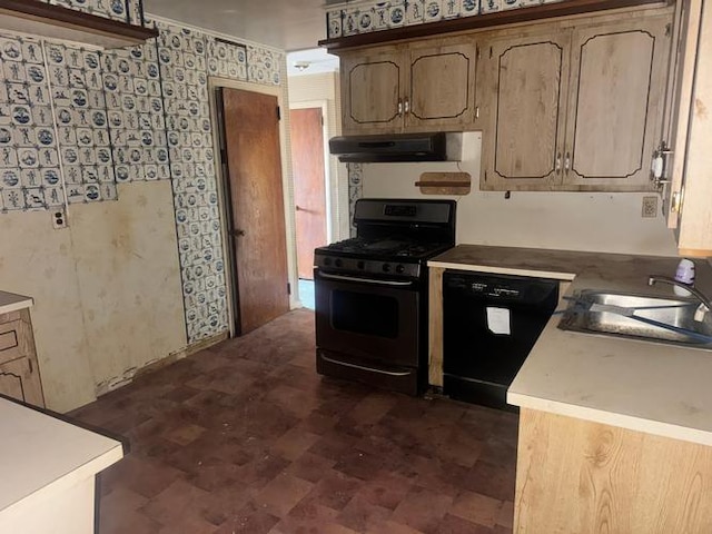 kitchen featuring sink, exhaust hood, and black appliances