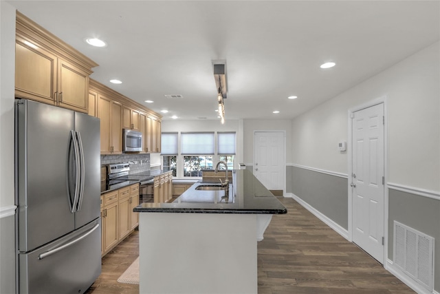 kitchen with sink, stainless steel appliances, dark hardwood / wood-style floors, a center island with sink, and light brown cabinetry