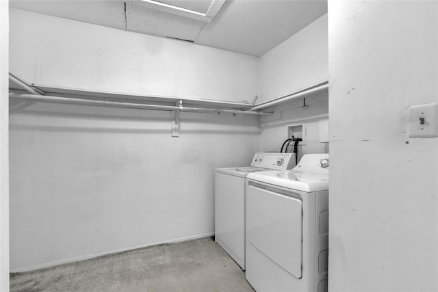 laundry room with washing machine and dryer