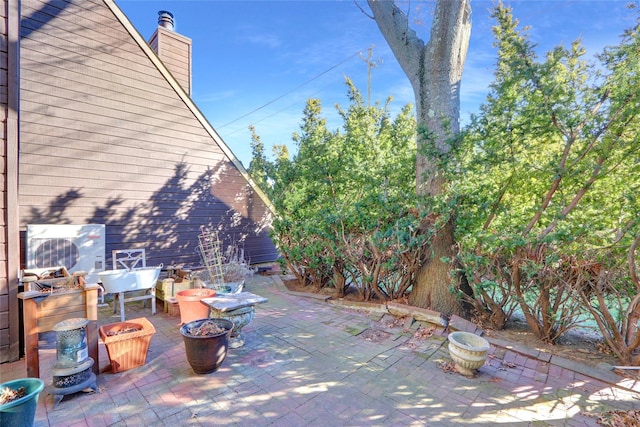 view of patio / terrace featuring a fire pit