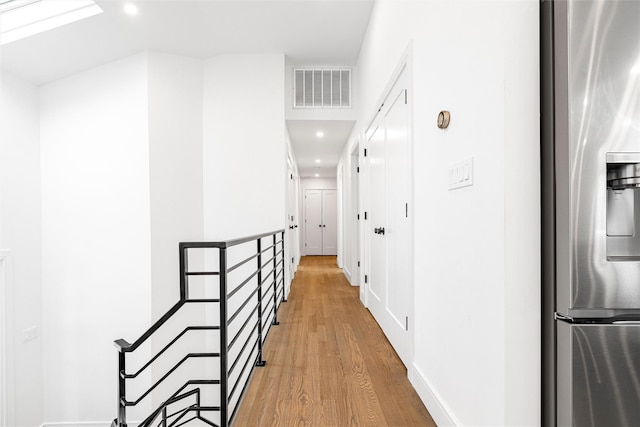 hall featuring light hardwood / wood-style floors