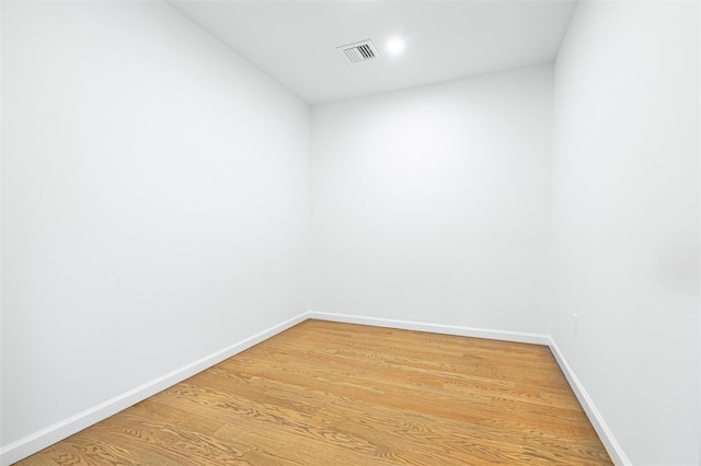 spare room featuring hardwood / wood-style flooring