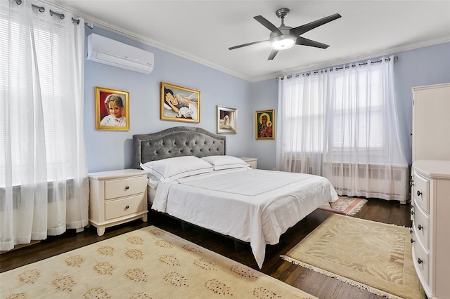 bedroom featuring ceiling fan, ornamental molding, dark hardwood / wood-style floors, and a wall unit AC