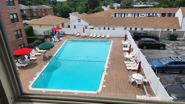 view of pool featuring a patio