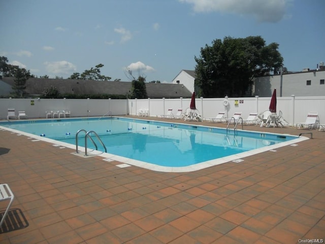 view of pool with a patio