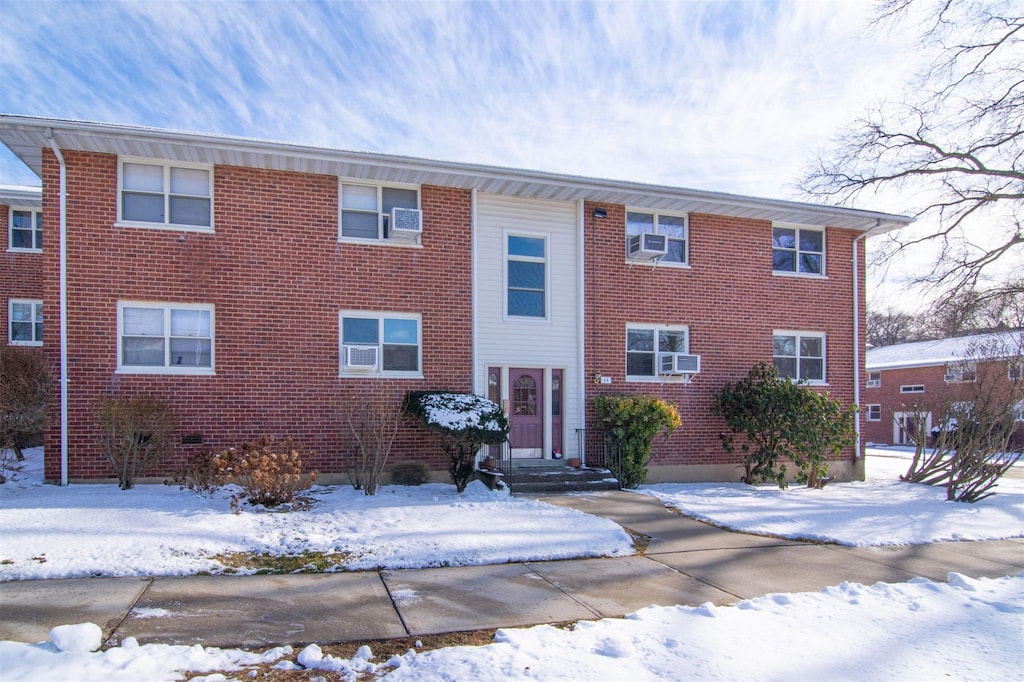 view of snow covered property