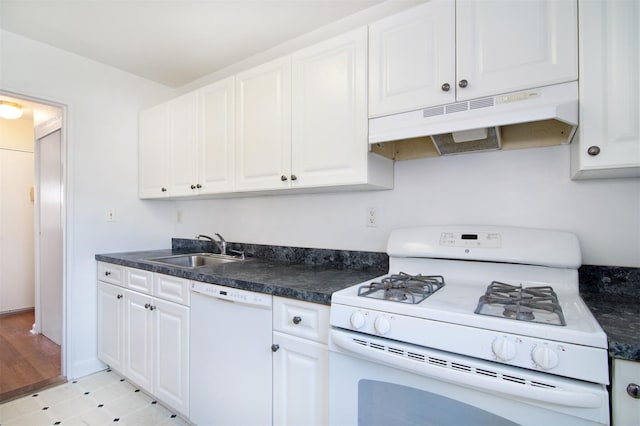 kitchen featuring white cabinetry, white appliances, and sink