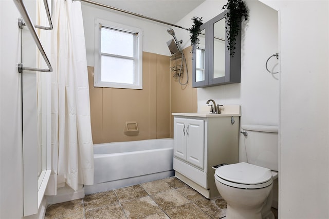 full bathroom with shower / tub combo with curtain, vanity, and toilet