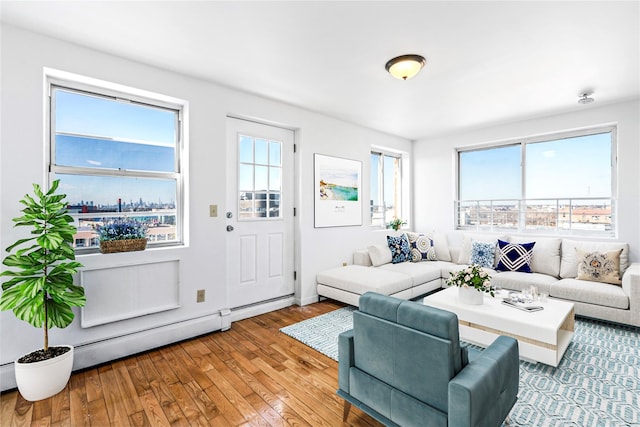 13616 31st Rd Unit 8B, Flushing, NY 11354 - living area featuring plenty of natural light and wood-type flooring