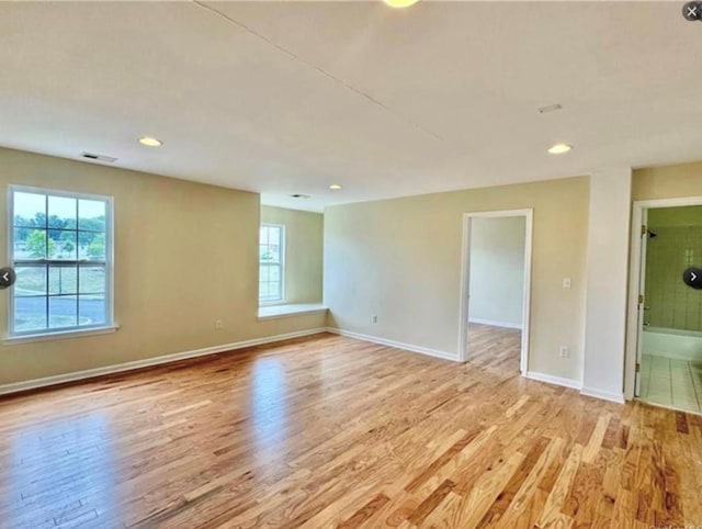 unfurnished room featuring light wood-type flooring