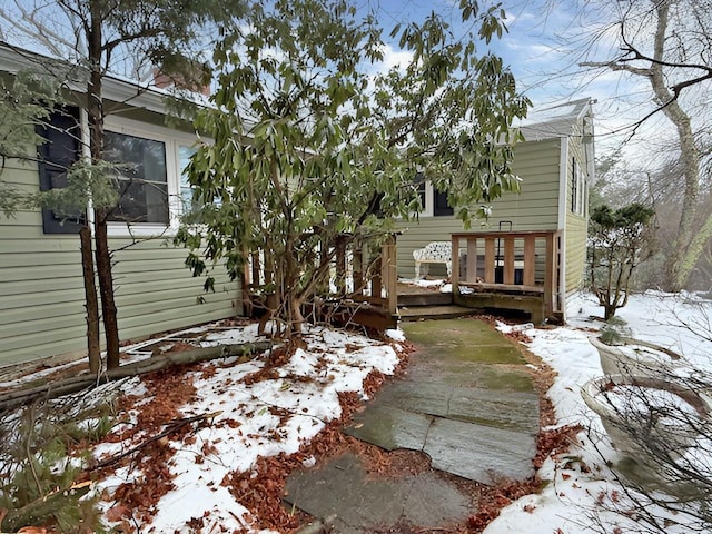 exterior space featuring a wooden deck