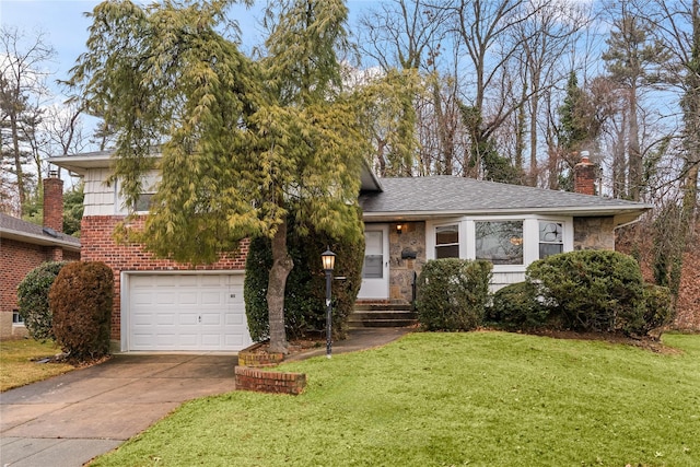 view of front facade with a garage and a front lawn