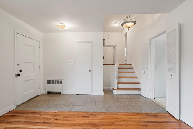 foyer with radiator heating unit