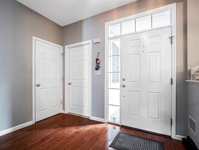 entryway featuring dark hardwood / wood-style floors