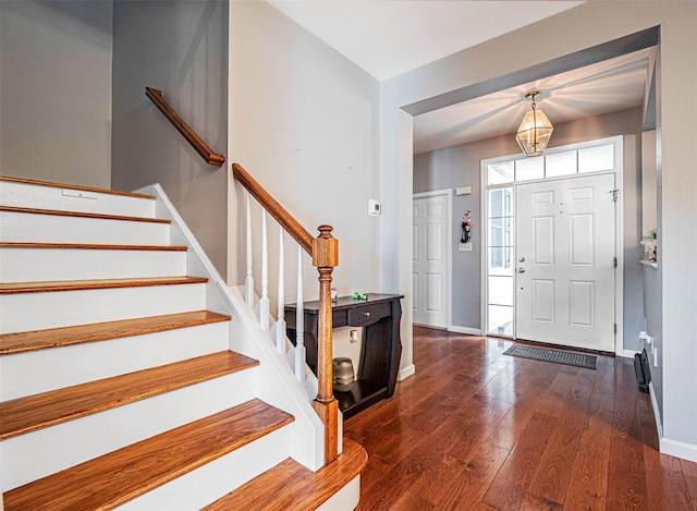 foyer featuring dark hardwood / wood-style floors