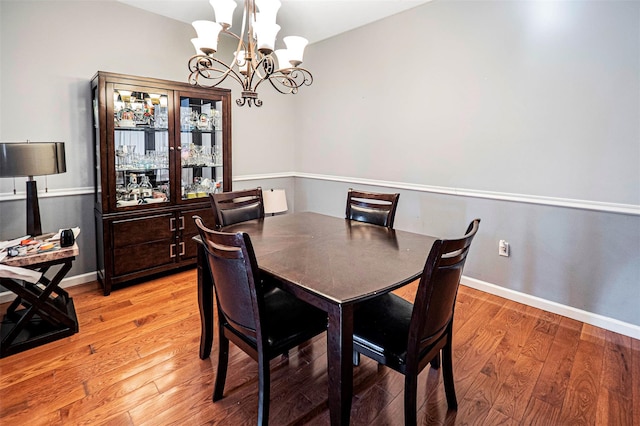 dining area featuring light wood-type flooring