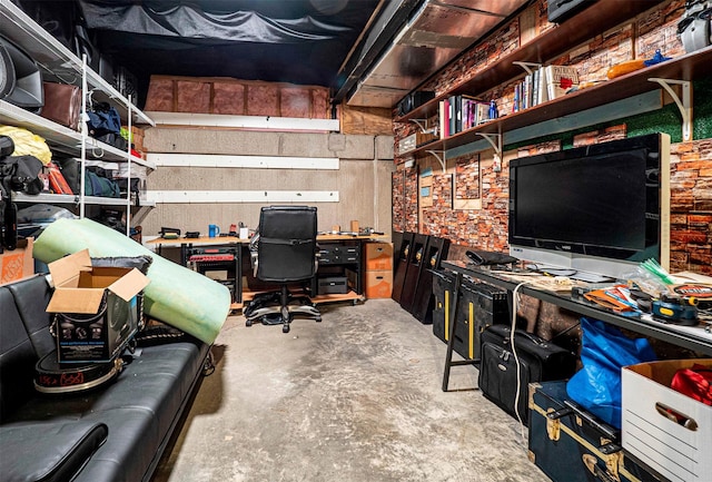 office featuring concrete flooring and a workshop area