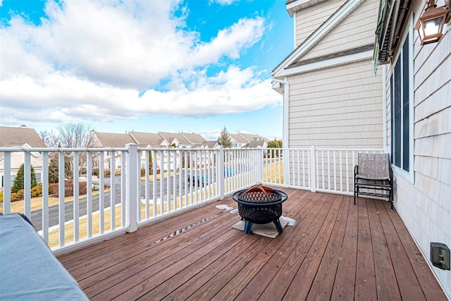 deck featuring a fire pit