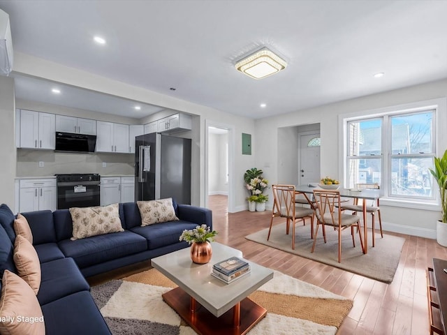 living room with light wood-type flooring