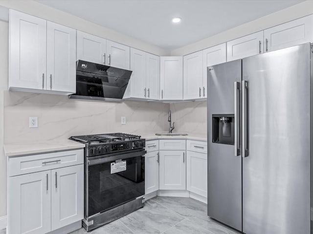 kitchen with high quality fridge, black gas range oven, range hood, white cabinetry, and sink