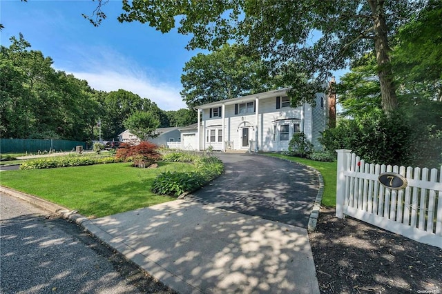 view of front of property with a front lawn