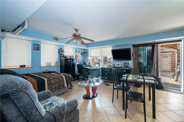 living room with light tile patterned floors and ceiling fan