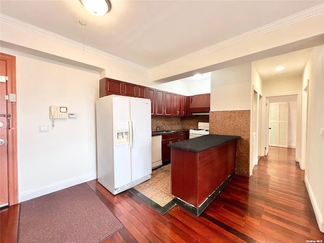 kitchen featuring crown molding, white appliances, dark hardwood / wood-style floors, and decorative backsplash