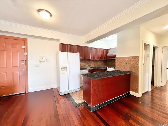 kitchen with premium range hood, crown molding, dark hardwood / wood-style floors, white appliances, and decorative backsplash